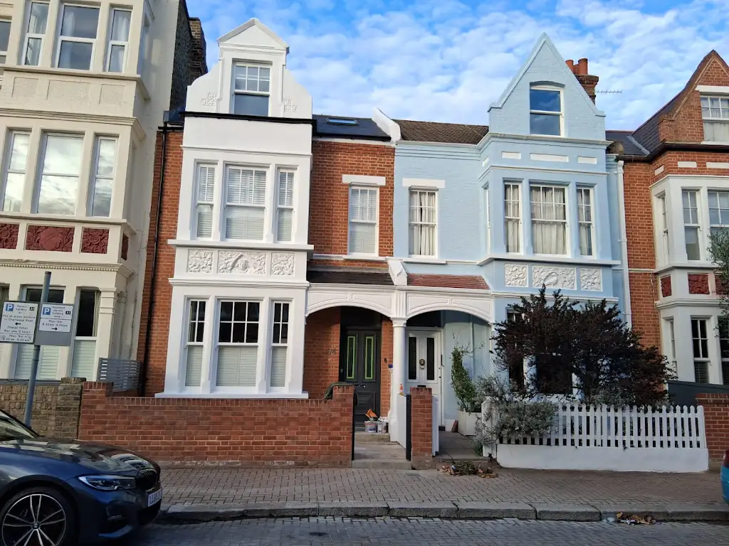 Victorian terraced houses repainted white and blue